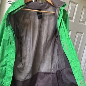 women’s green light rain jacket
